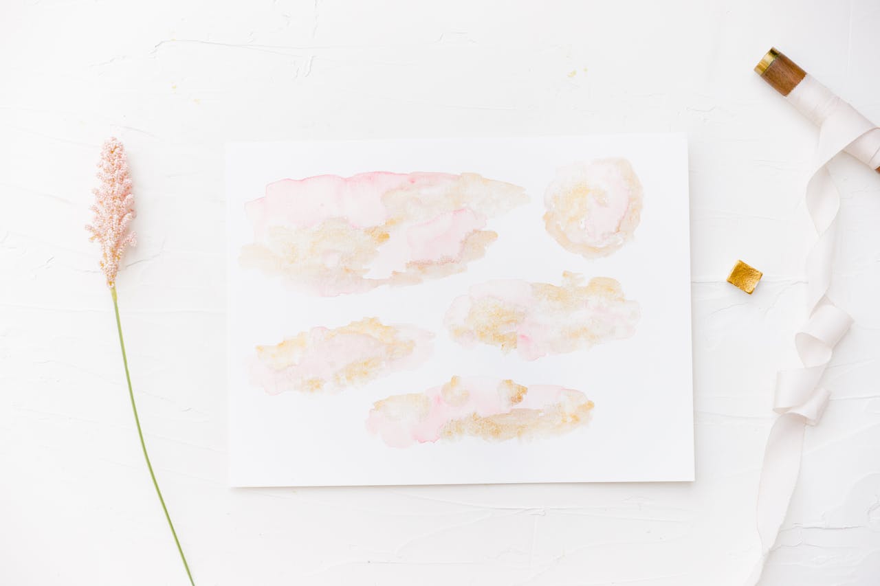gallery-6 Minimalist watercolor painting on paper with a pink flower on white background.