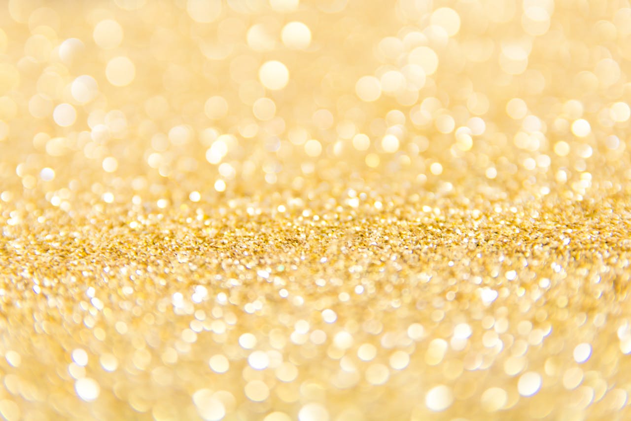 gallery-3 Abstract gold glitter background with a bokeh effect, ideal for festive designs.